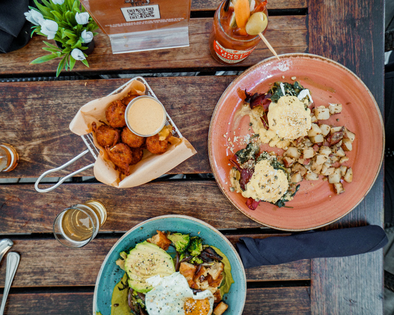 Overhead photo of a brunch spread on the rooftop patio